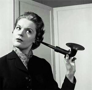 Picture of woman listening with a cone in her ear, simonegiuliani.wordpress.com